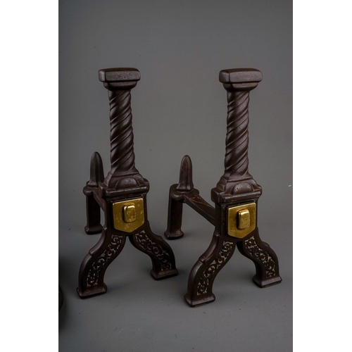 714 - A pair of cast iron fire dogs in manner of Gothic revival together with cobbler's last and small fla... 