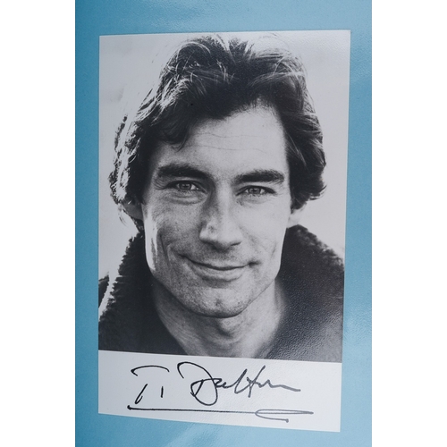 723 - Autographs, a folder of approximately one hundred signed photographs of actors from TV series and fi... 