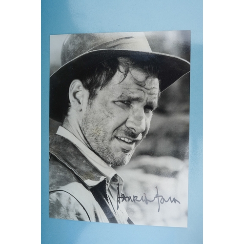 723 - Autographs, a folder of approximately one hundred signed photographs of actors from TV series and fi... 