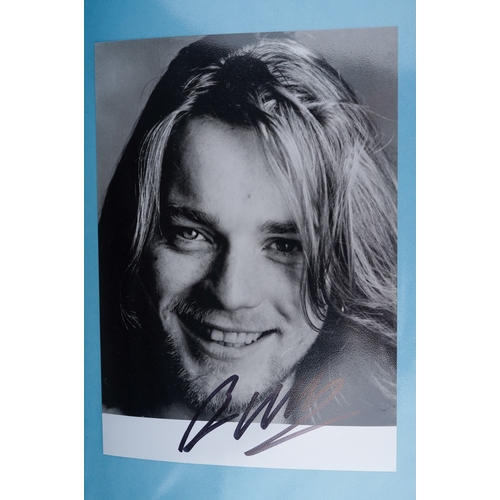 723 - Autographs, a folder of approximately one hundred signed photographs of actors from TV series and fi... 