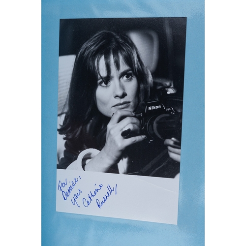 723 - Autographs, a folder of approximately one hundred signed photographs of actors from TV series and fi... 