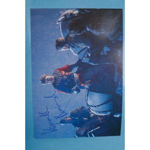 723 - Autographs, a folder of approximately one hundred signed photographs of actors from TV series and fi... 