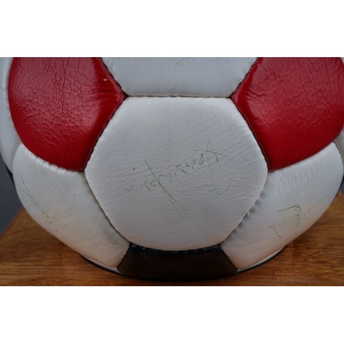 733 - A Manchester United Football Club Official Souvenir Football, bearing faded signatures including Gar... 