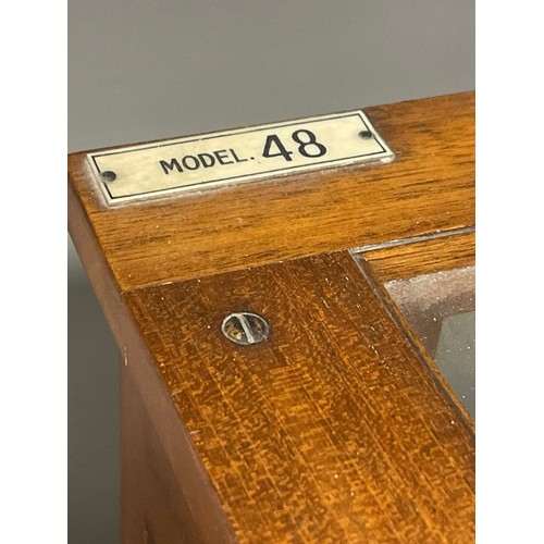 745 - A cased L Oertling of London Model 48 scientific balance scales, in wooden and glazed case, the case... 