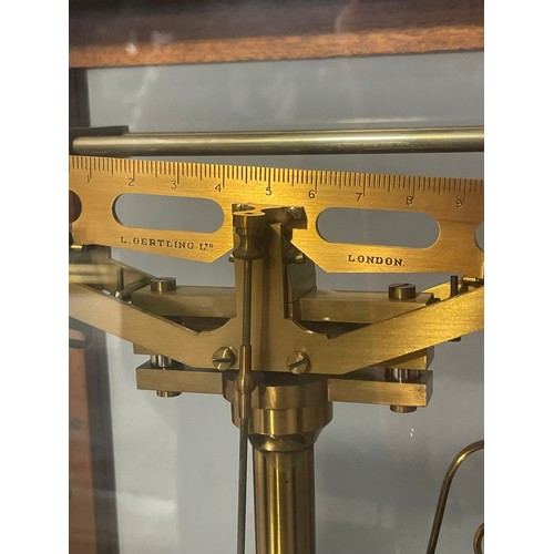 745 - A cased L Oertling of London Model 48 scientific balance scales, in wooden and glazed case, the case... 