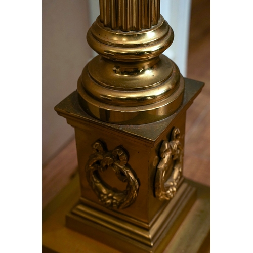 747 - An early 20th century brass telescopic standard lamp stand, with Corinthian column, stepped square b... 