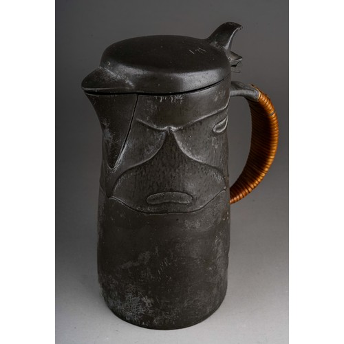 765 - Archibald Knox for Liberty and Co, an Arts & Crafts Tudric pewter lidded jug, model 0278, cast in re... 