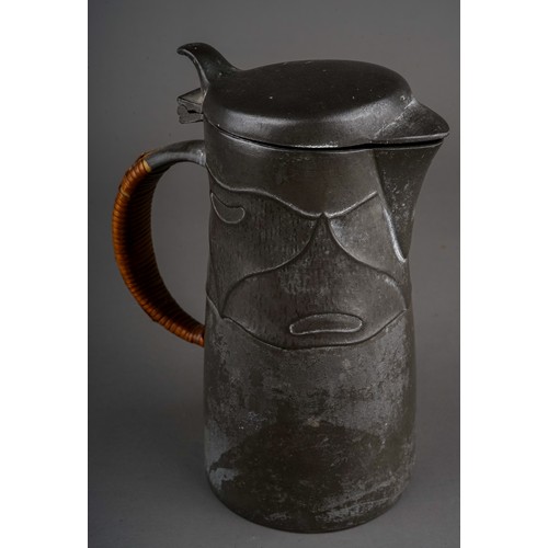 765 - Archibald Knox for Liberty and Co, an Arts & Crafts Tudric pewter lidded jug, model 0278, cast in re... 