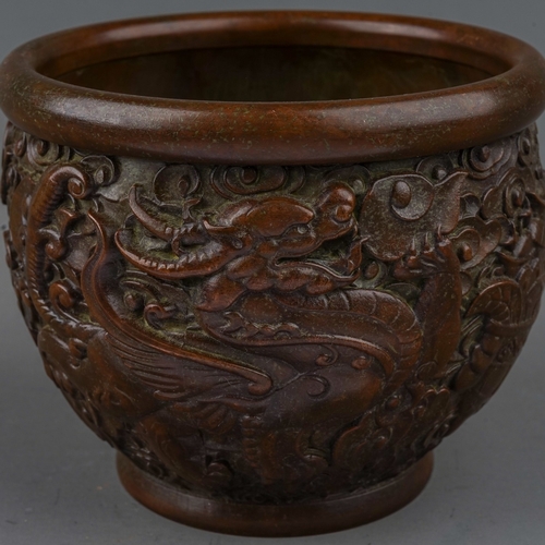 767 - Chinese Bronze Bowl decorated with kylin amongst clouded background with Koro mark to base