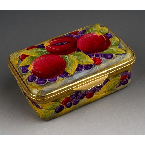 771 - A Moorcroft enamel on copper decorated 'Pomegranate' pattern pill box, hinged lid, printed marks to ... 