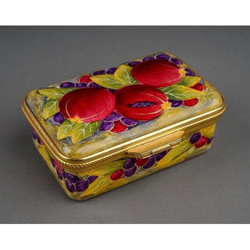 771 - A Moorcroft enamel on copper decorated 'Pomegranate' pattern pill box, hinged lid, printed marks to ... 