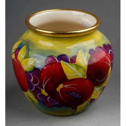 772 - A Moorcroft enamel on copper decorated 'Pomegranate' pattern vase, printed marks to base, 4.5 cm tal... 