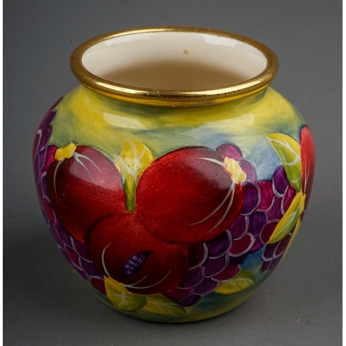 772 - A Moorcroft enamel on copper decorated 'Pomegranate' pattern vase, printed marks to base, 4.5 cm tal... 