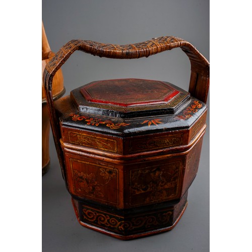 779 - Two pieces of Chinese treen, comprising a lacquered and painted single tier octagonal wedding basket... 