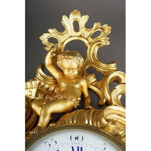 836 - A 19th century Marchand of Paris ormolu cartel clock, the Rococo style case cast with a putti sittin... 