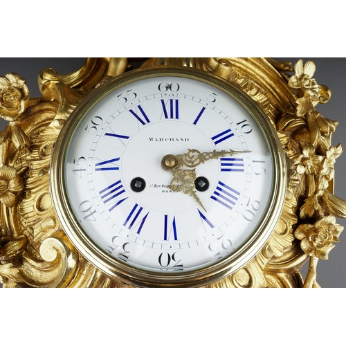 836 - A 19th century Marchand of Paris ormolu cartel clock, the Rococo style case cast with a putti sittin... 