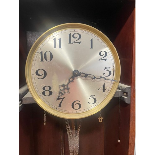 837 - A 20th Century mahogany longcase clock, circa 1930s, the silvered dial with Arabic numerals, glazed ... 