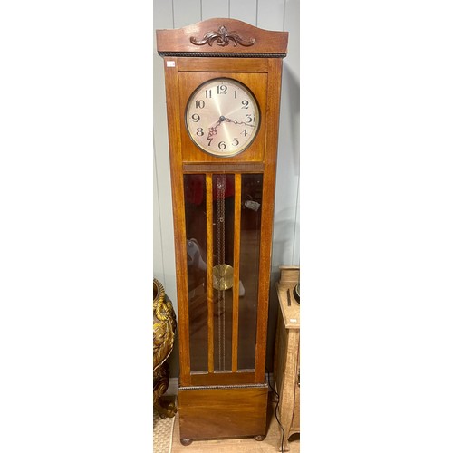 837 - A 20th Century mahogany longcase clock, circa 1930s, the silvered dial with Arabic numerals, glazed ... 