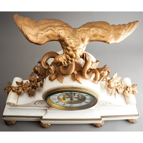 839 - A 19th Century French ormolu mounted marble clock, the drum head dial with volute scrolls supports a... 