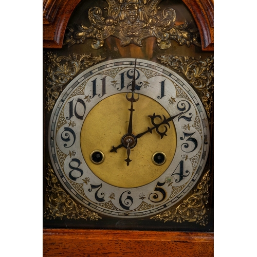 842 - A Continental mantle clock, with 8 day movement and coiled gong, in Architectural style walnut case ... 