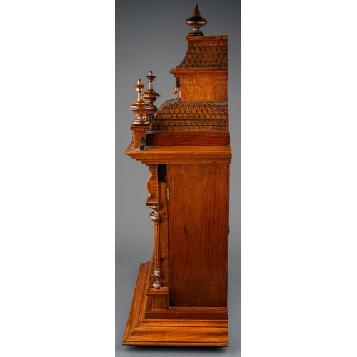 842 - A Continental mantle clock, with 8 day movement and coiled gong, in Architectural style walnut case ... 