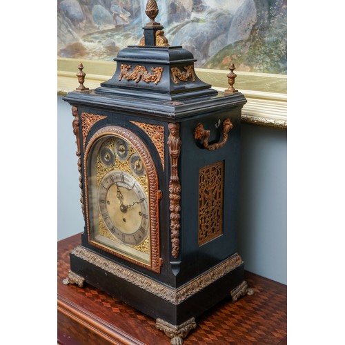 848 - A late 19th century Howell & James ebonised and gilt metal bracket clock, eight day movement, caddy ... 