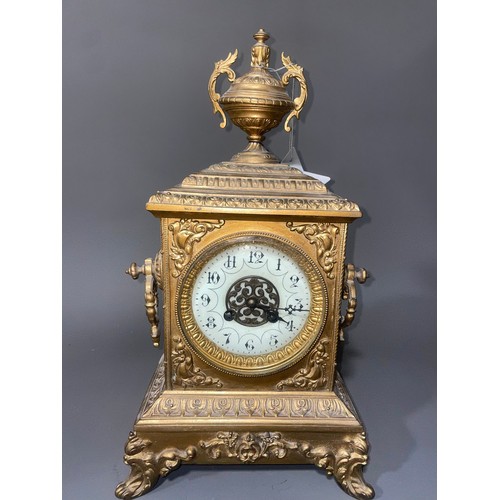 850 - A 19th Century French giltmetal mounted mantle clock, the cream enamel dial with Arabic numerals, su... 