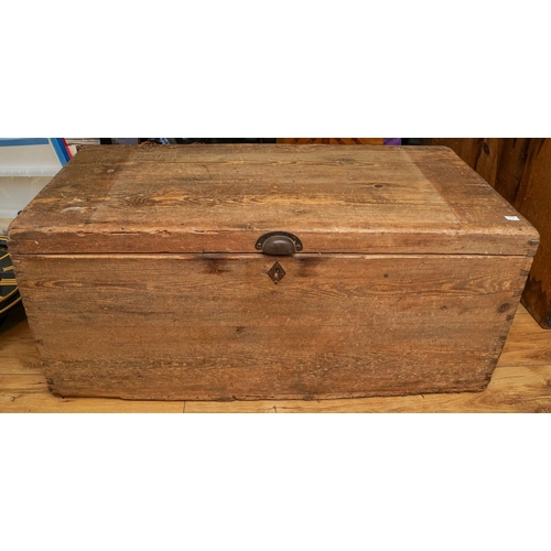 851 - A Victorian pine blanket chest of rectangular form, the hinged lid loose due to a split to the backb... 