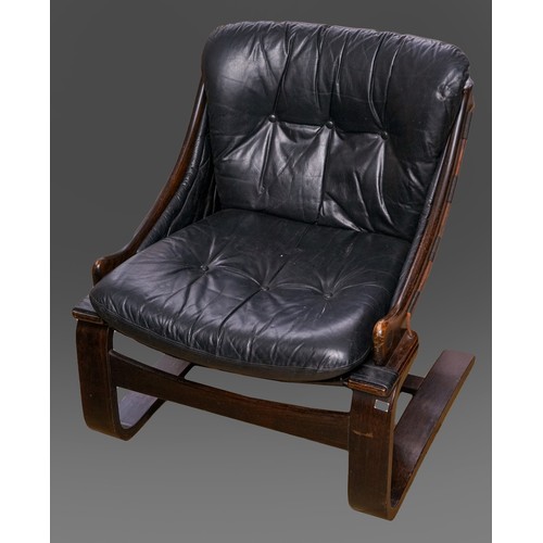 859 - A Danish Kroken black leather and stained beech lounge chair by Ake Fribytter for Nelo Sweden 1970s.... 