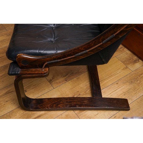 859 - A Danish Kroken black leather and stained beech lounge chair by Ake Fribytter for Nelo Sweden 1970s.... 