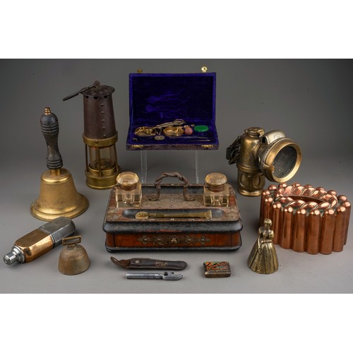 678 - A box of 19th and 20th century metalware, including a Victorian oval copper jelly mould, length 17cm... 