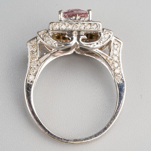 206 - A 14k white gold pink sapphire and diamond ring, set with a mixed-cut pink sapphire approx 7.6mm x 6... 