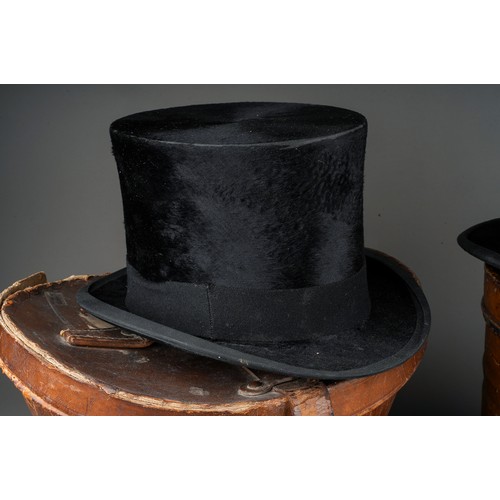 746 - Two early 20th Century black top hats to include: Woodrow\ Densem & Sons and Christys London togethe... 