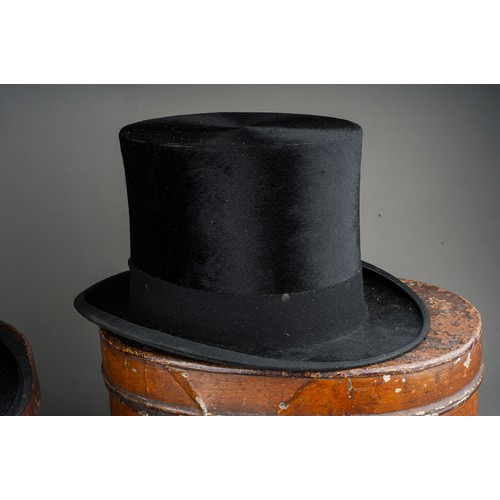 746 - Two early 20th Century black top hats to include: Woodrow\ Densem & Sons and Christys London togethe... 