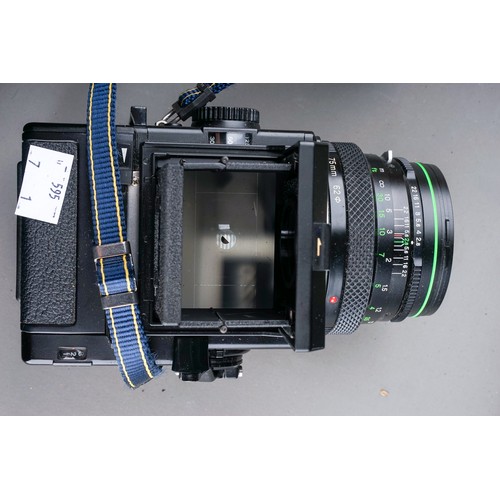 664 - A zenza Bronica ETRS medium format camera with a zenzanon 75mm f/2.8 lens along with two film back m... 