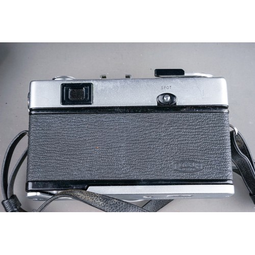 664 - A zenza Bronica ETRS medium format camera with a zenzanon 75mm f/2.8 lens along with two film back m... 