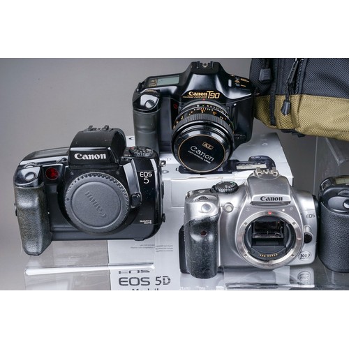 663 - A collection of Canon Cameras to include a Canon EOS 20D camera with a 18-55mm EF-S f5-5.6, a Canon ... 