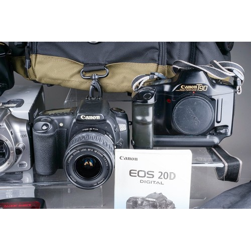 663 - A collection of Canon Cameras to include a Canon EOS 20D camera with a 18-55mm EF-S f5-5.6, a Canon ... 