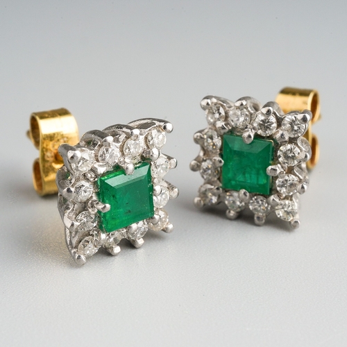 13 - A pair of 18ct gold emerald and diamond square cluster earrings, set with a rectangular emerald with... 