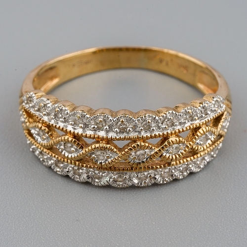 27 - A 9ct yellow gold and diamond dress ring, size R, gross weight approx 3.6g, diamond weight stamped t... 