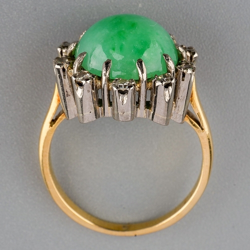 29 - A jade and diamond cluster ring, set with a jadeite cabochon and single cut diamonds, ring unmarked,... 