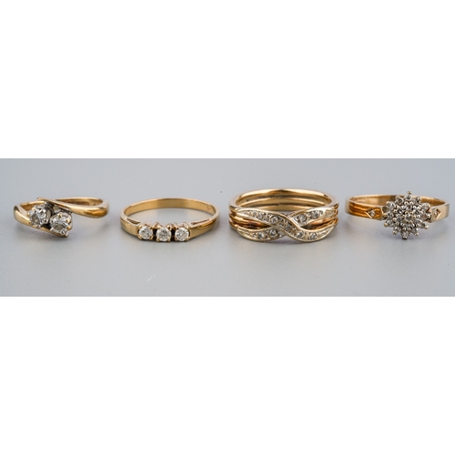 30 - Four 9ct yellow gold and diamond rings, including a two-stone size E; a three-stone size K; a cluste... 