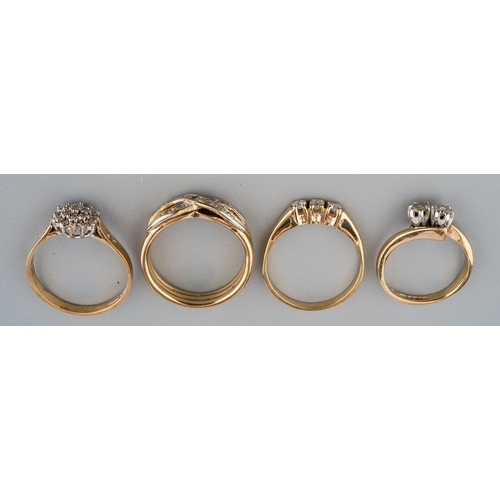 30 - Four 9ct yellow gold and diamond rings, including a two-stone size E; a three-stone size K; a cluste... 