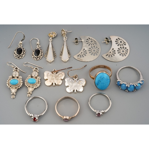 31 - A collection of silver jewellery, including silver gem set rings, silver earrings, pair of marcasite... 