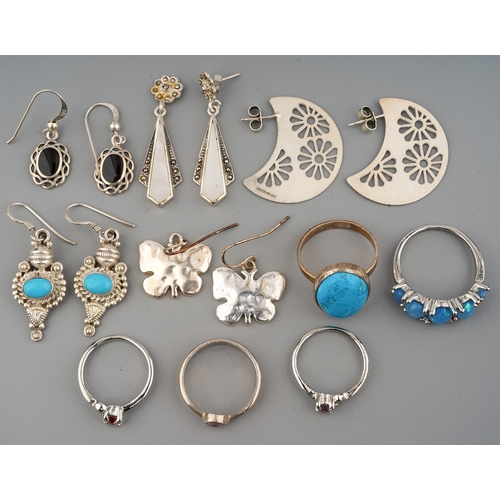 31 - A collection of silver jewellery, including silver gem set rings, silver earrings, pair of marcasite... 