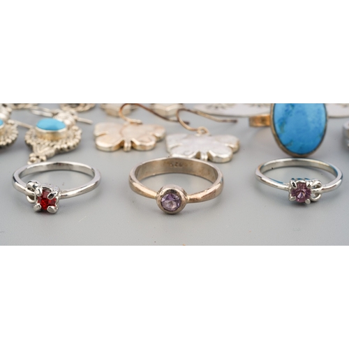 31 - A collection of silver jewellery, including silver gem set rings, silver earrings, pair of marcasite... 