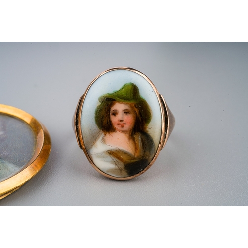 35 - A Victorian yellow metal cameo brooch; a 9ct yellow gold ring, set with a continental porcelain plaq... 