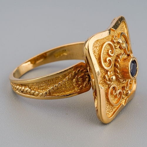 42 - A yellow gold and sapphire square dress ring, size N, unmarked assessed as approx 18ct, gross weight... 