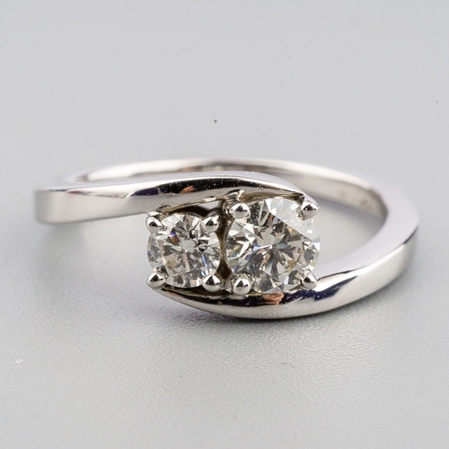 45 - A Sophia Fiori Hearts of Fire 18ct white gold two stone diamond ring. total diamond weight approx 1c... 