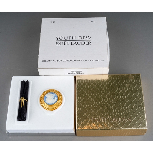 51 - A small group of costume jewellery and a boxed Estee Lauder Youth Dew 50th anniversary cameo compact... 